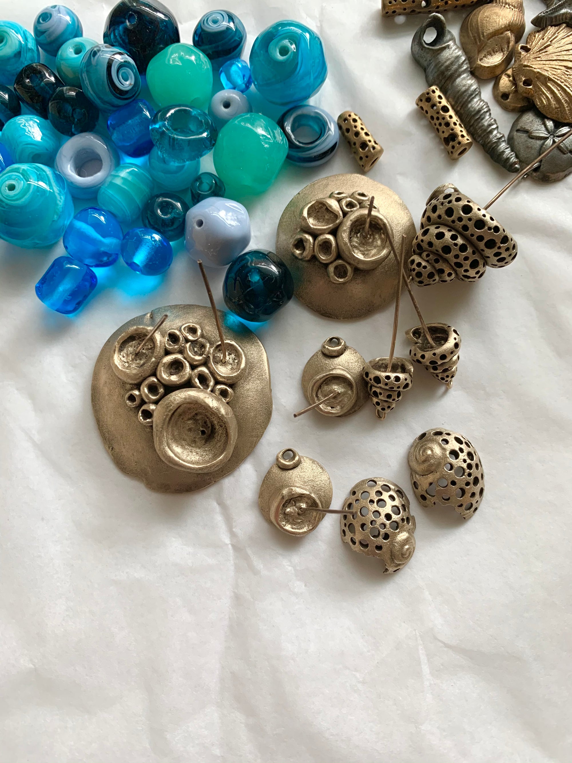 Ocean inspired bronze and blue jewelry pieces