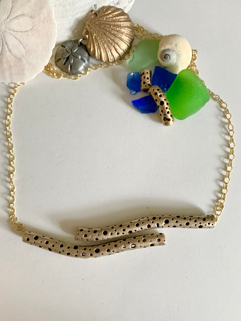 Hand carved artisan made bronze beads seashells and sea glass