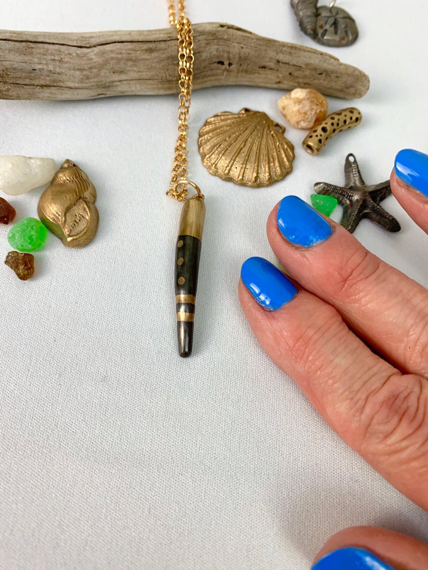 Ocean blues, sea glass, shells and driftwood