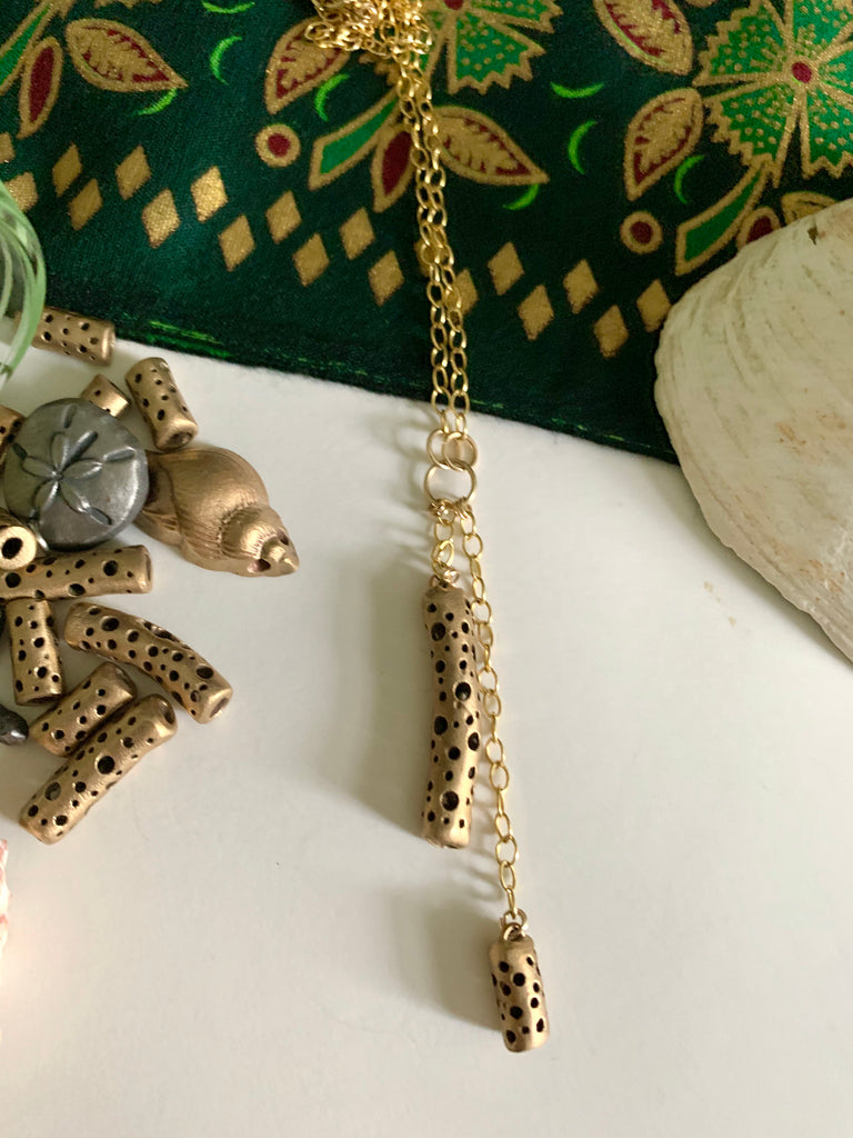 Artisan made necklace in bronze with green and red tropical Bali Batik