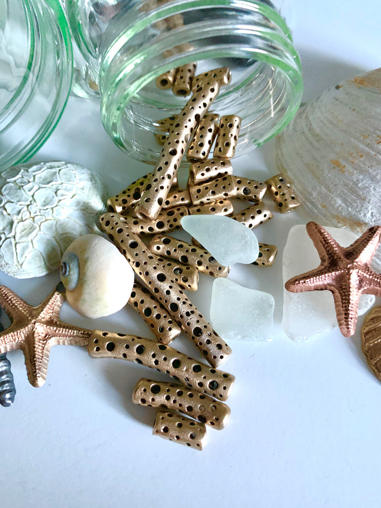 Isles bronze hand carved bead collection