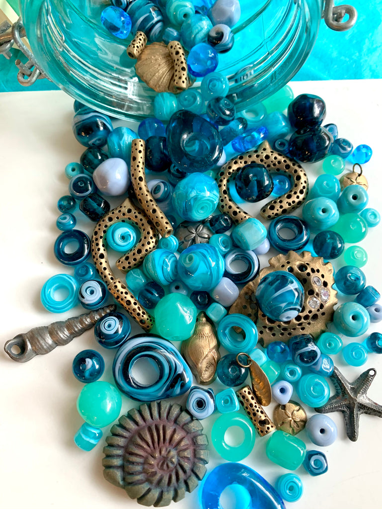 Sea blue beads with bronze artisan jewelry pieces