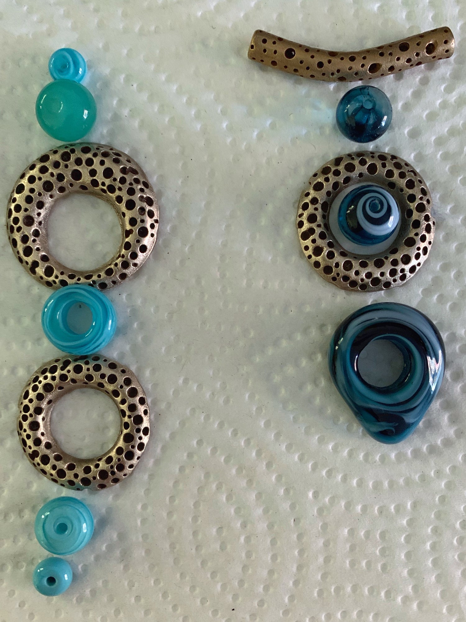 Bronze and blue artisan made jewelry pieces