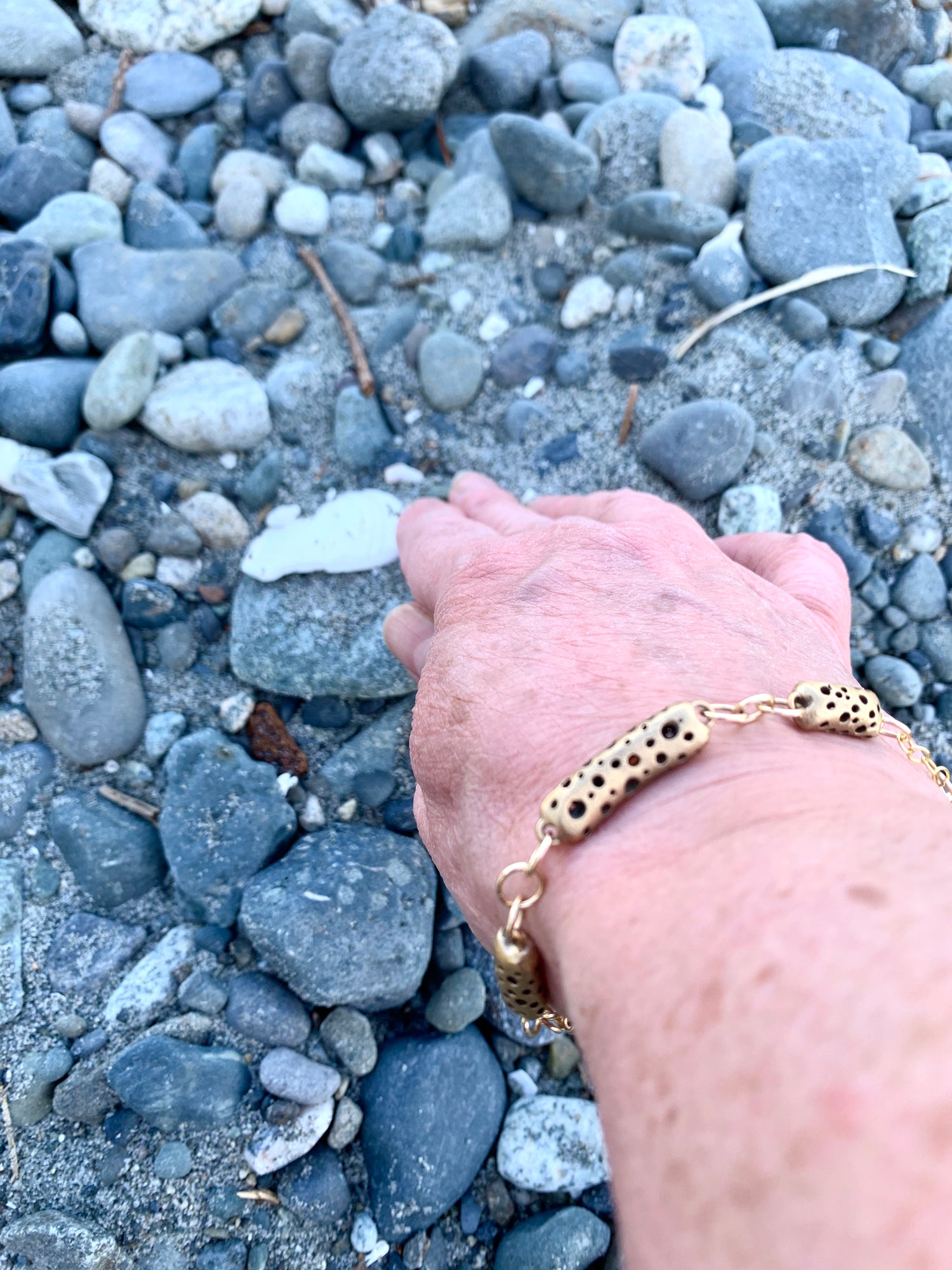 Bronze {bracelets} beachcombing