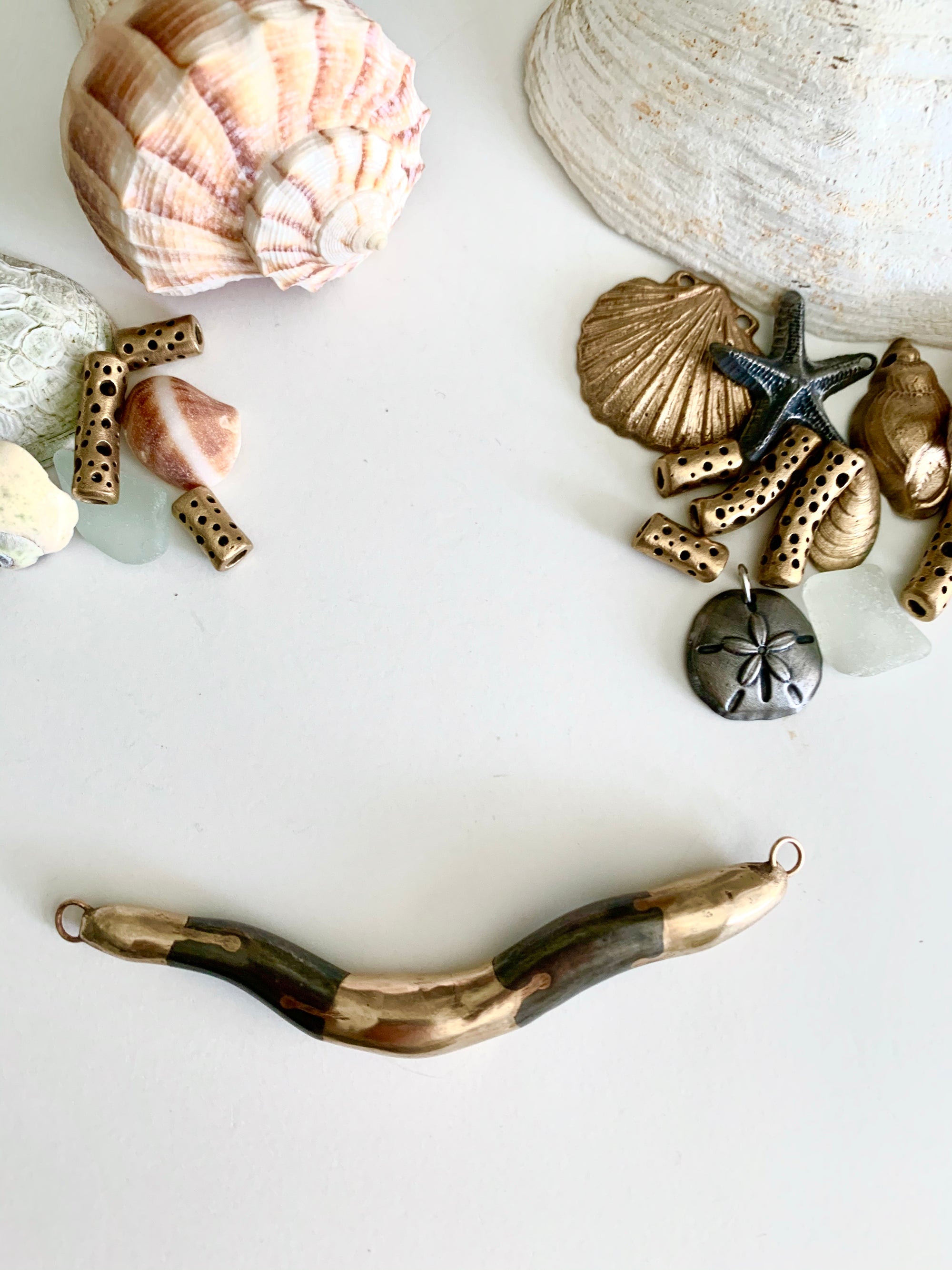 Bronze and {steel} jewelry pieces