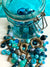 Ocean coloured glass beads with bronze and jar