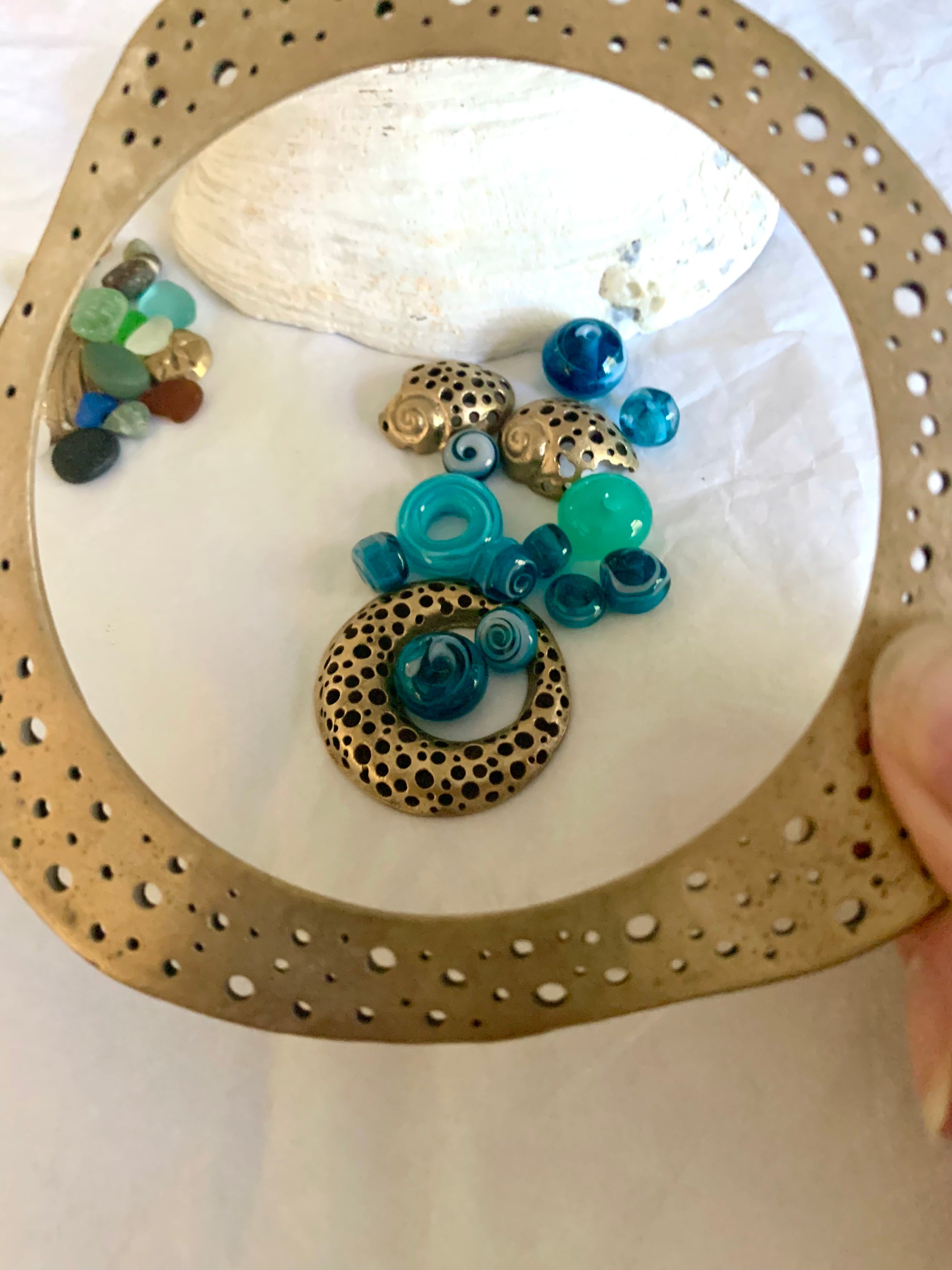 Ocean inspired bronze and glass jewelry
