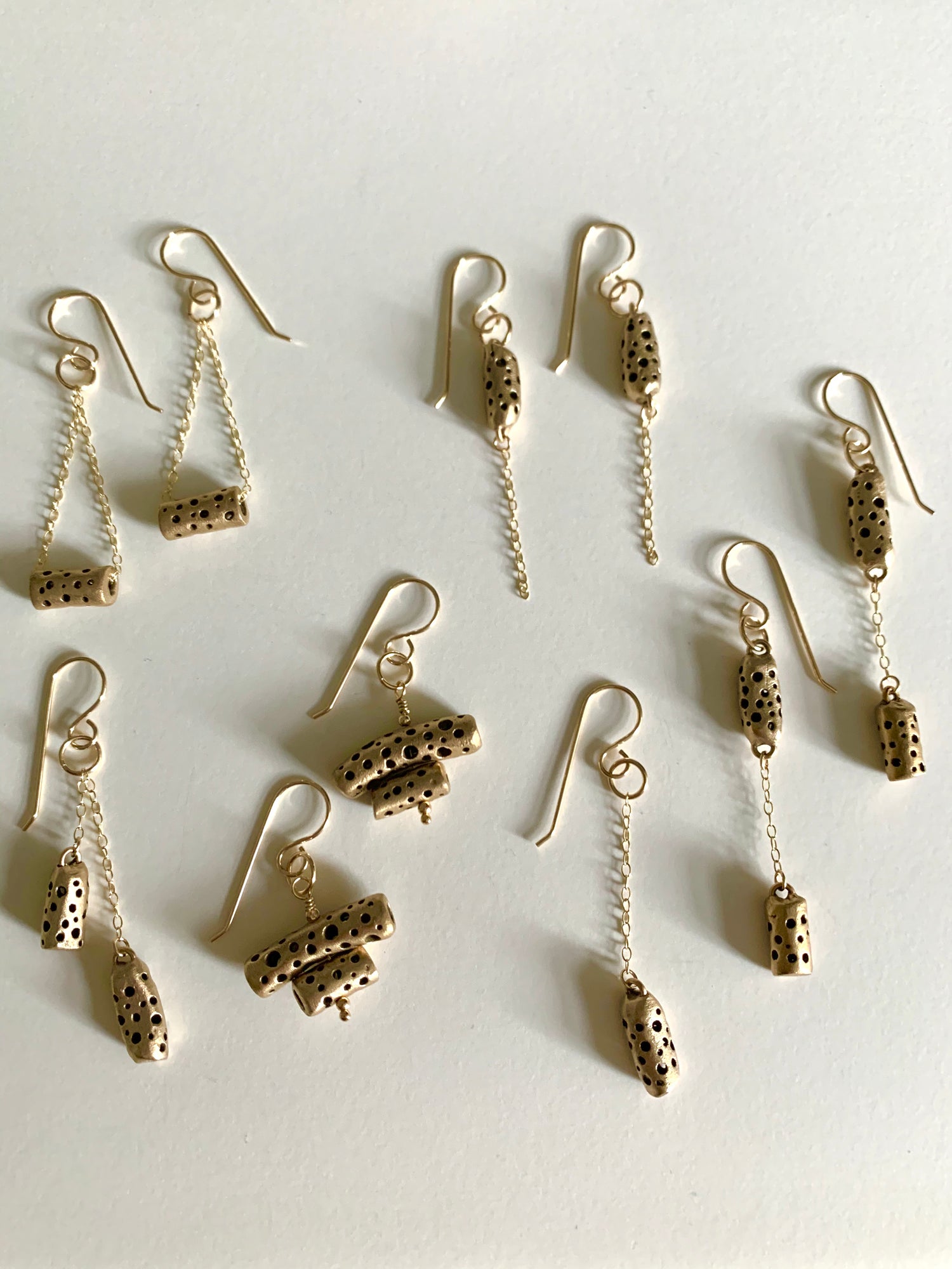 {Bronze bead} earrings galore