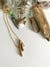 Bronze artisan made necklace matches driftwood
