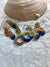 Ocean coloured handmade bronze earrings with clamshell