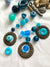 Blue artisan glass beads with bronze handmade rings for jewelry