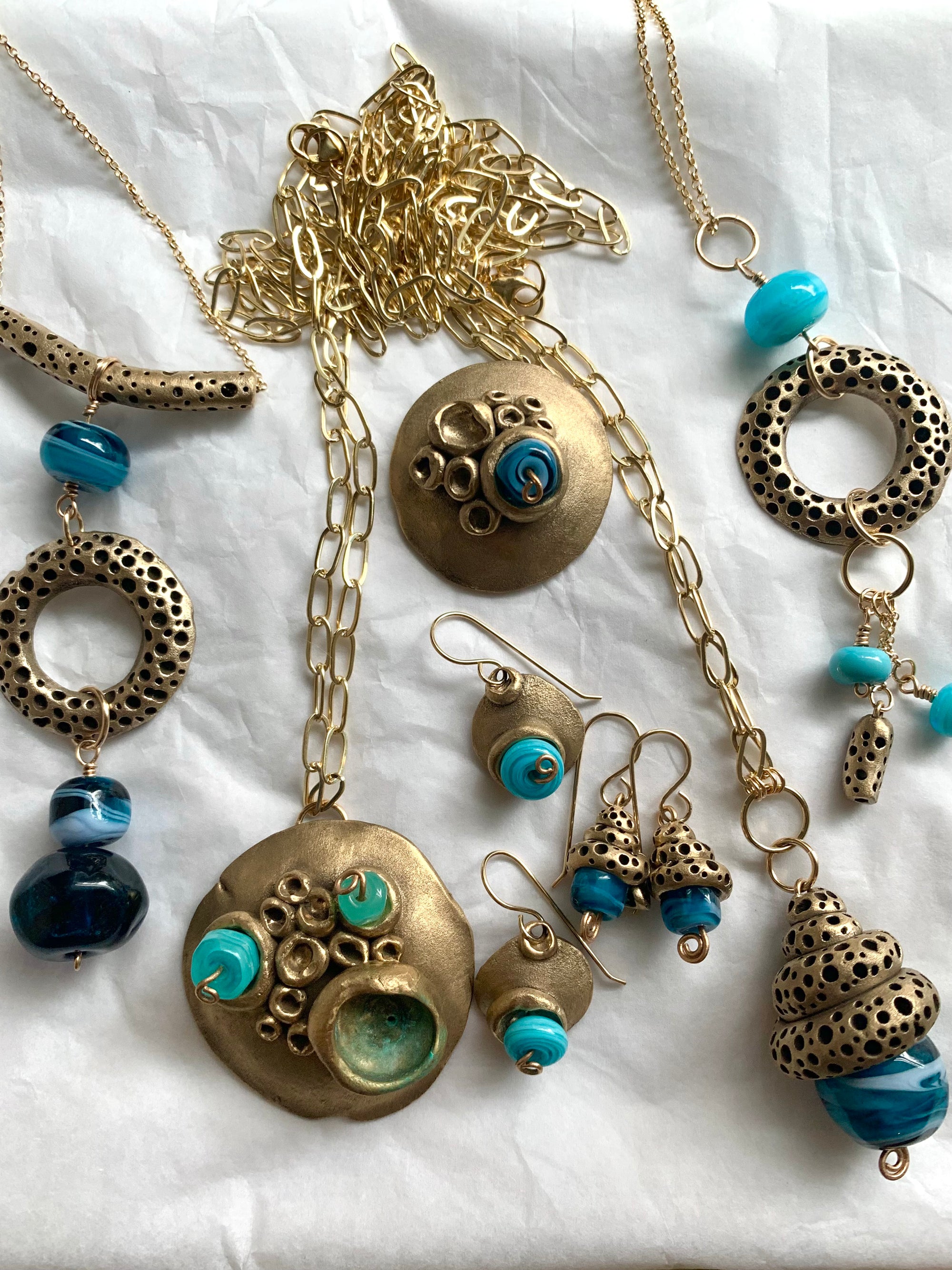 Bronze and blue glass artisan made ocean inspired jewelry